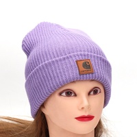 Bonnet tricoté jacquard en tissu chaud couleur unie, style européen et américain, avec petite étiquette en cuir, pour femme adulte, collection automne-hiver, transfrontalier