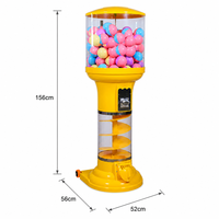 Distributeur automatique de bonbons et de jouets en capsules à monnayeur, avec jeu de boules de gomme et de bonbons rebondissants en spirale