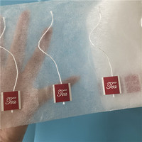 Rouleau compostable rouleau de matériau de filtre à thé en fibre de maïs pour machine d'emballage automatique qui peut faire un sac triangle et un sac carré