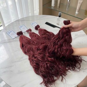 Produit phare : Extensions de cheveux Remy vietnamiens ondulés en trame, prix de gros usine - Product Image 1