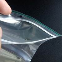 Sachet alimentaire biodégradable en LDPE à fond plat, refermable avec fermeture éclair, taille et logo personnalisables, offre une résistance thermique fiable et une protection optimale contre l'humidité.