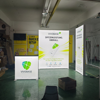 Stand d'exposition modulaire en tissu tendu SEG avec éclairage LED pour technologie d'énergie propre durable, idéal pour les salons professionnels de produits écologiques