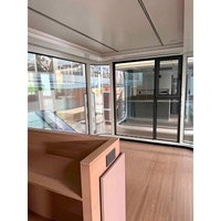 Cabane Apple moderne préfabriquée en acier léger sur roues, entièrement équipée, mobile, pour jardin, bureau, salon ou chambre à coucher
