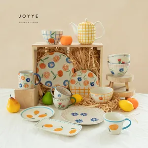 Joyye 2024 캔톤 페어 새로운 디자인 제품 유약 꽃과 과일 패턴 세라믹 석기 식기 아래 손으로 그린