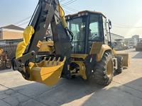 XC870K Backhoe Loader Mesin Diesel 82KW Bucket 1CBM Mesin Konstruksi Efisiensi Tinggi