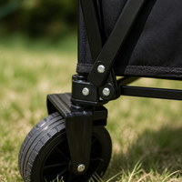 Chariot de camping familial pliable avec un grand espace de rangement, quatre roues, poignée réglable et mode repose-pieds