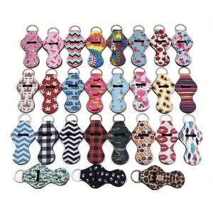 Portabálsamos de neopreno con llavero, funda para bálsamo labial, llavero metálico, impresión personalizada para tiendas de belleza y venta al por menor - Product Image 1