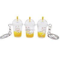 Vente directe d'usine Eagle : Porte-clés personnalisé en acrylique avec thé à bulles liquide flottant pour cadeaux de fêtes et clés de voiture