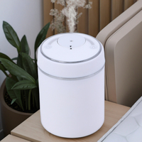 Diffuseur d'aromathérapie électrique portable pour la maison en plastique noir puissant diffuseur de parfum de voiture de petite capacité à très faible bruit