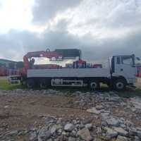 Camión Grúa Shacman 8*4 de 20 Toneladas con Pluma Hidráulica Articulada, Camión Grúa Plegable Changxing para Transporte de Piedra