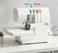 Machine à coudre surjeteuse domestique manuelle JK703 en promotion avec moteur pour la confection de vêtements à domicile