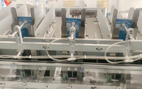 Machine de remplissage et d'emballage automatique de masques faciaux pour grande production, machine de remplissage de sachets de masques, machine d'emballage de ruban adhésif pour masques
