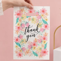 Sacs de courses en plastique recyclables personnalisés en PEHD/PEBD avec impression offset, poignées découpées et message de remerciement, pour vêtements