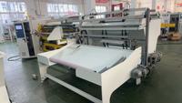 Machine de rembobinage automatique à trois axes pour ruban adhésif/ruban BOPP