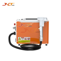 Machine de nettoyage au laser pulsé portable, type manuel, pour le nettoyage des surfaces en métal, de la rouille, de la peinture, de la graisse, de l'oxyde.
