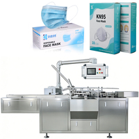 Machine d'emballage automatique de masques jetables pour masques N95, machine d'emballage de boîtes de masques KF94, machine d'emballage de cartons de masques