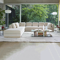 Canapé modulaire contemporain haut de gamme en tissu avec structure métallique, idéal pour les projets commerciaux tels que les halls d'hôtels, les complexes hôteliers et les villas.