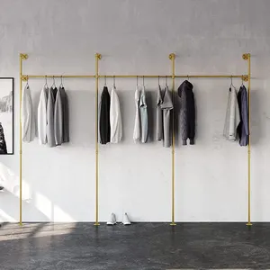Lüks giyim mağazası ekran standı mağaza konfeksiyon altın giyim rafları Metal paslanmaz çelik duvara monte giysi asılı raf
