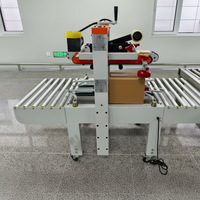 Machine de scellage de rubans semi-automatique à réglage manuel de la largeur, pour le conditionnement de petites lots
