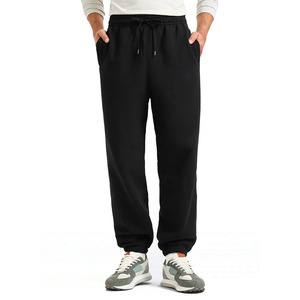 Pantalones deportivos de cintura media, antiarrugas, suaves, de secado rápido para hombre, pantalones deportivos clásicos para hombre con tela transpirable y de ajuste relajado. - Product Image 1