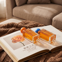 Vente en gros de flacons de parfum rechargeables de 30 ml, 50 ml et 100 ml, collection unique avec un design de bouchon en marbre et un emballage de luxe avec sac cadeau doré