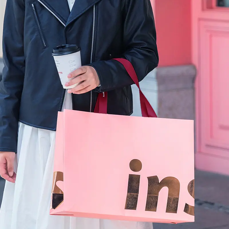 Sacchetti della spesa del sacchetto di carta regalo rosa di lusso personalizzati stampati personalizzati con loghi