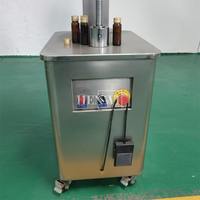 Machine à sertir les boîtes de conserve Henwi, pour sceller les boîtes rondes en fer blanc, pour la production de lait en poudre, de peinture et de conserves alimentaires
