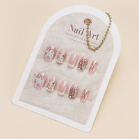 Vente en gros de faux ongles en acrylique faits à la main, courts, en forme d'amande, avec fleurs 3D, pré-conçus, logo personnalisable
