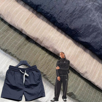 Tissu tissé 100% nylon taffetas froissé, anti-UV, imperméable, respirant, surface mate, certifié OEKO-TEX, léger, ripstop, pour sacs