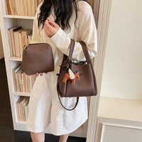 Sac à main de luxe pour femme en PU grain litchi, sac seau, sac bandoulière simple avec fermeture magnétique, léger, style urbain et épuré