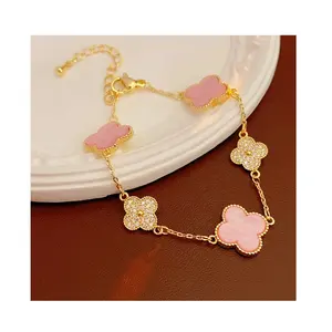 Étanche exquis 18k plaqué or Zircon trèfle à quatre feuilles ensemble de bijoux de mode filles femmes Valentine Bracelet anneau boucles d'oreilles