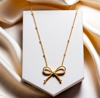 Collier nœud papillon en acier inoxydable 316L plaqué or 18 carats, design minimaliste, idée cadeau parfaite pour les femmes et les filles