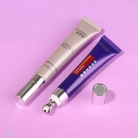 Tube cosmétique en plastique de 10 ml avec bouchon en alliage de zinc de luxe, applicateur de massage, emballage personnalisé haut de gamme, tube souple pour le soin des yeux