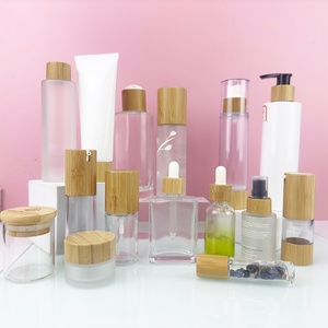 Envases Cosméticos, Juego de Botellas de Vidrio Esmerilado de 60 y 100 ml para Loción y Spray, con Bomba de Bambú, Gotero y Rodillo, Productos de Bambú - Product Image 1