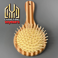 Brosse à cheveux démêlante en bois de bambou Stripe Fashion avec coussin, facile à nettoyer, non jetable, noire, vente en gros, personnalisable
