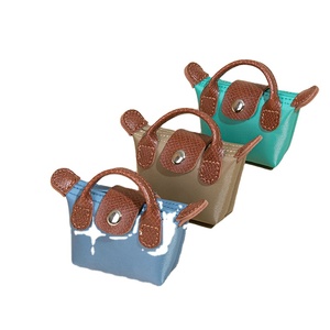 Sac à main tendance et simple, ultra-mini, léger, style français, pour pièces <span class=keywords><strong>de</strong></span> <span class=keywords><strong>monnaie</strong></span>, écouteurs, clés, petit sac suspendu en nylon, rangement facile - Product Image 4