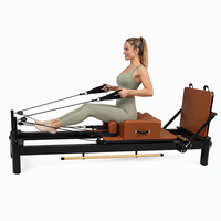 Nouveau modèle, prix usine, lit de Pilates Reformer commercial noir en aluminium avec barre de traction coulissante pour studio de Pilates Body Balanced