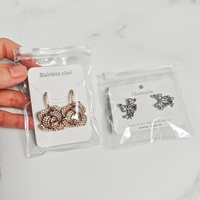 Fabricant chinois OEM personnalisé de plusieurs tailles Pvc plastique transparent petite boucle d'oreille pochette à bijoux avec fermeture éclair