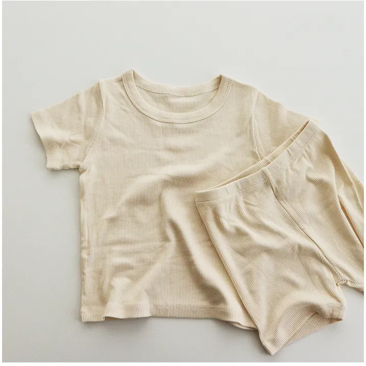 Mini ensemble de vêtements en coton côtelé doux pour l'été Ensemble pour enfants de couleur unie minimale Vêtements pour bébé de couleur beige