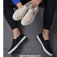 Offre Spéciale en caoutchouc à la mode hommes baskets décontracté chaussures noires hommes sans lacet toile Sneaker