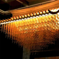 Grand lustre personnalisé à LED en bois pour le hall d'hôtel Lampe en rotin au design unique et moderne en cristal Décoration de chambre