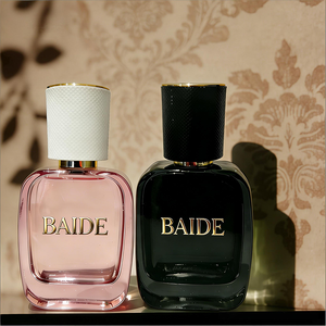 Venta al por mayor de fábrica: Botellas de perfume de vidrio rosa personalizadas de 30ml, 50ml, 100ml, con forma irregular negra, vacías, para serigrafía, ecológicas. - Product Image 1