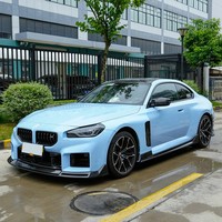 Kit carrosserie complet en fibre de carbone sèche style V pour BMW G87 M2 : lames avant, diffuseur arrière et jupes latérales