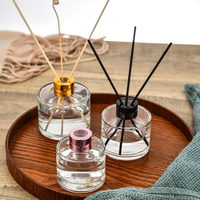 Vente en gros de bouteille diffuseur ronde de luxe personnalisée de 100ml 200ml bouteille vide en verre diffuseur d'anche avec couvercles