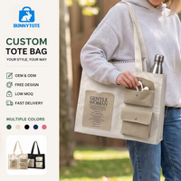 BunnyTote Tas Tote Kanvas Pola Huruf Sedang yang Tahan Lama dengan Kantong Multi Snap Kontras dan Label Cetak untuk Penggunaan Iklan, Cocok untuk Buku A4.