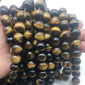 Venta al por mayor de cuentas de piedra natural de ojo de tigre de calidad 12mm - Product Image 3
