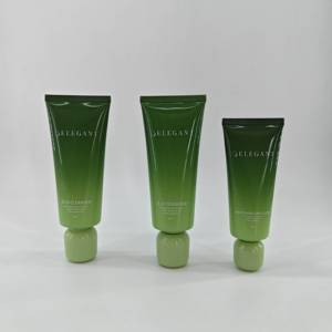 Venta al por mayor de tubos cosméticos elegantes de plástico verde de 60 ml y 100 ml con tapa de rosca y diseño de logotipo con impresión offset brillante para limpiador facial. - Product Image 1