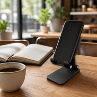 Support réglable pour téléphone portable et tablette, compatible universellement avec iPhone et autres marques, sûr et durable pour une utilisation sur le bureau