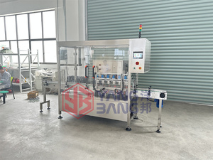 YB Máquina automática de tapado al vacío de tarros de vidrio de 4 cabezales para taponadora de botellas de pasta de bebida de Nido de Pájaro - Product Image 5