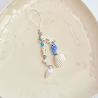 Colgante de concha de cerámica con forma de pez, cadena para teléfono móvil, llavero, estilo Ins, colgante para bolso con concha marina y estrella de mar, colgante para bolso hecho a mano con temática oceánica y cuentas